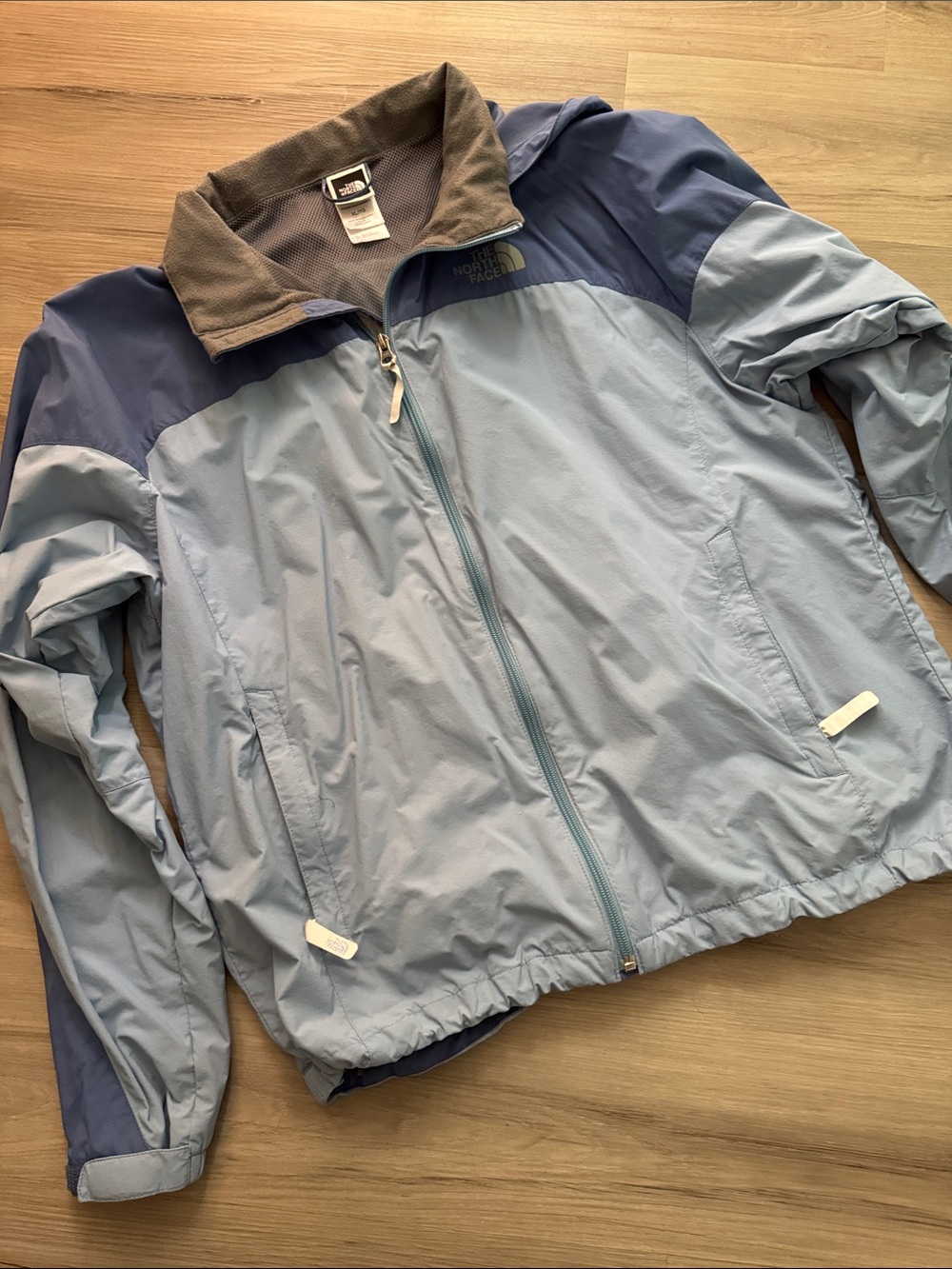 The North Face Two-Tone Light Blue and Navy Windbreaker Jacket
